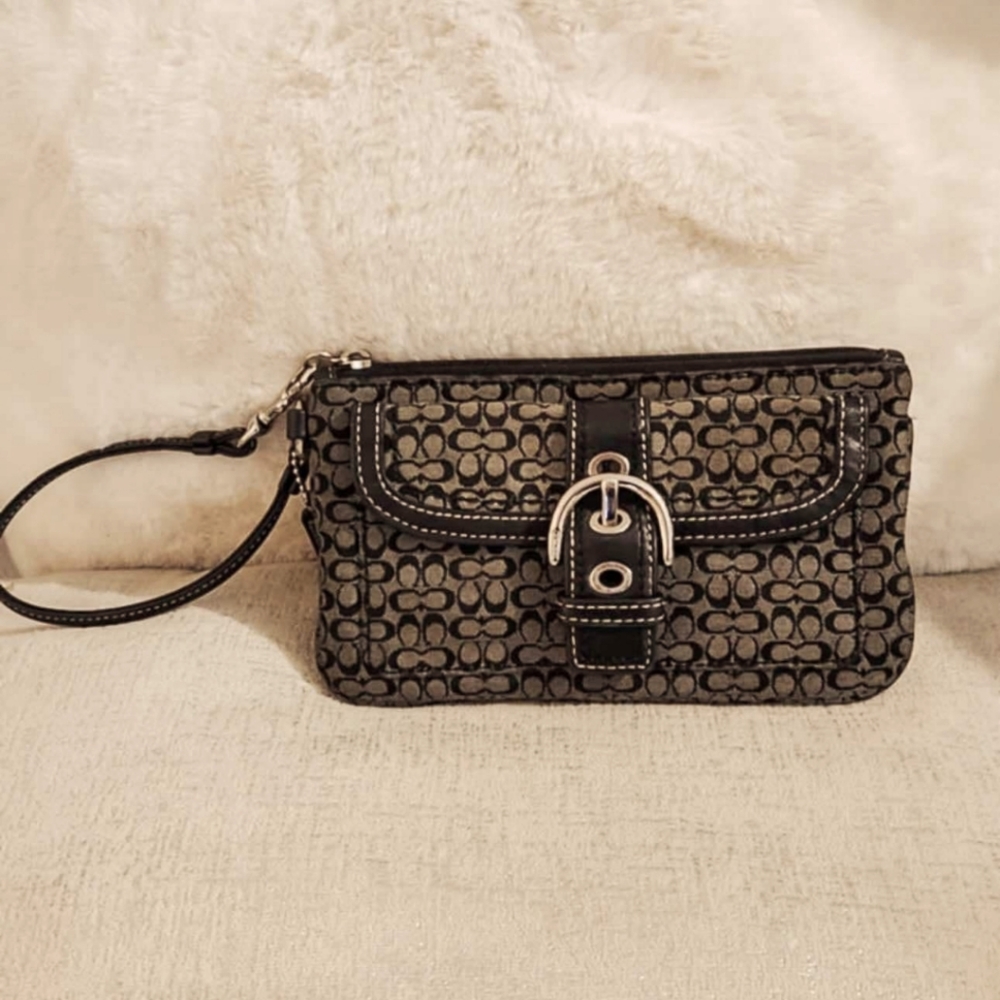 Coach signature wristlet. New. Black/brown.